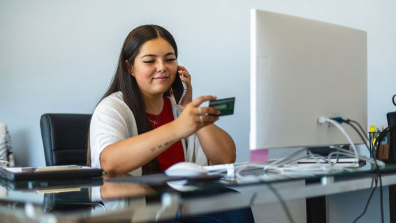 Latina checking credit card