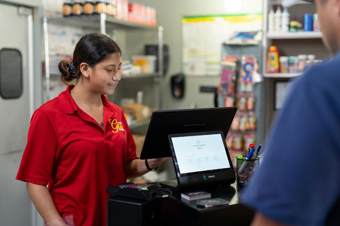 Latino woman cashier