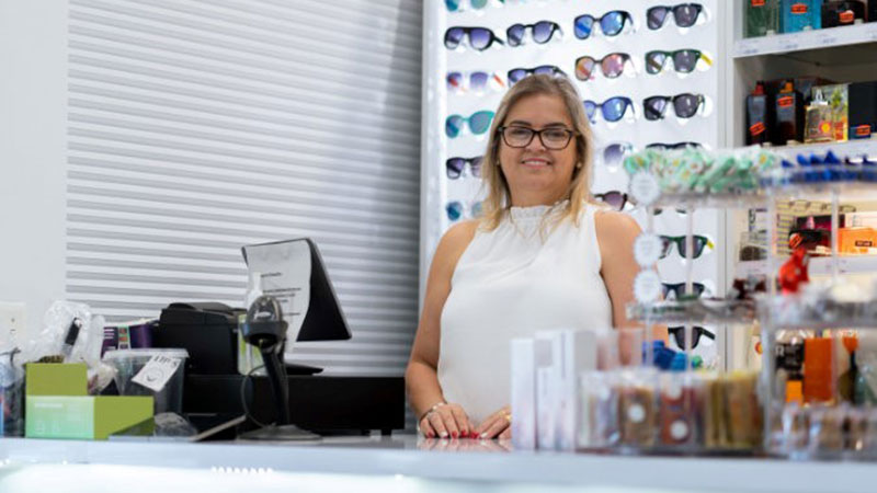 Woman corner store owner